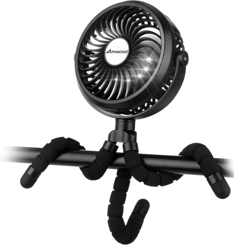 Black AMACOOL portable clip-on stroller fan with flexible tripod legs attached to a stroller handle, blowing air.