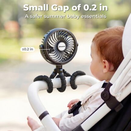 Black AMACOOL portable clip-on stroller fan with flexible tripod legs attached to a stroller handle, blowing air.