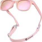 Bright pink COCOSAND flexible polarized baby sunglasses with an adjustable strap, shown on a white background.