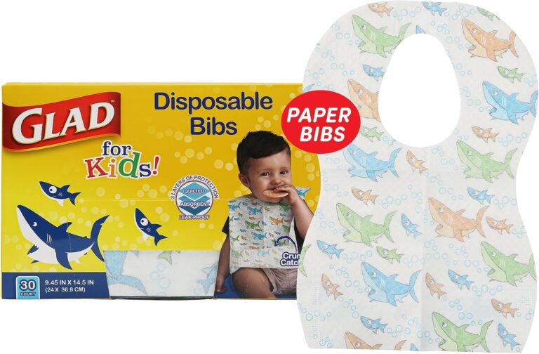 A stack of 30 Glad for Kids disposable paper bibs, showing the colorful shark pattern and crumb catcher pocket.