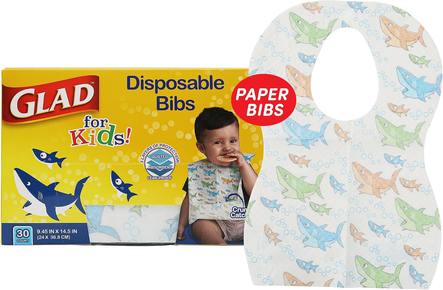 glad-for-kids-disposable-paper-bibs-with-crumb-catcher-shark-theme-30-count-01 A stack of 30 Glad for Kids disposable paper bibs, showing the colorful shark pattern and crumb catcher pocket.