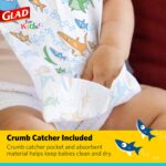 A stack of 30 Glad for Kids disposable paper bibs, showing the colorful shark pattern and crumb catcher pocket.