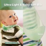 A haakaa Cloud Crew 5-piece green silicone baby travel feeding set with a foldable plate, bib, spoon, fork, and travel bag.