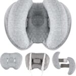 Light grey KAKIBLIN infant travel pillow with a heart shape, providing head and neck support for babies.