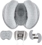 Light grey KAKIBLIN infant travel pillow with a heart shape, providing head and neck support for babies.