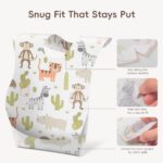A stack of individually wrapped KIIS disposable baby bibs featuring a colorful cartoon animal pattern.
