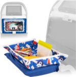 Lusso Gear Airplane Tray Table Cover with plane pattern, showing pockets filled with kids' travel essentials and a tablet.