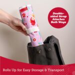 Lusso Gear Airplane Tray Table Cover with plane pattern, showing pockets filled with kids' travel essentials and a tablet.