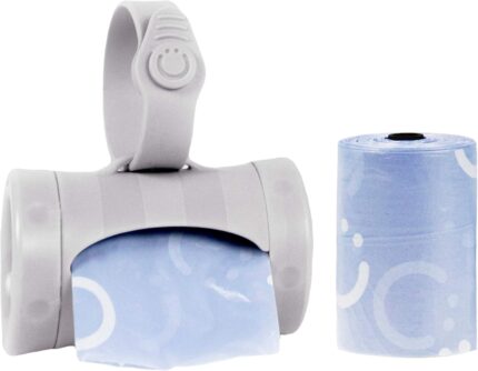 Gray retractable diaper bag dispenser with a roll of lavender-scented bags, clipped to a stroller handle.