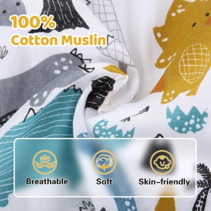 Close-up of a Rquite muslin car seat cover with a dinosaur pattern, draped over an infant car seat.