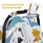 Close-up of a Rquite muslin car seat cover with a dinosaur pattern, draped over an infant car seat.
