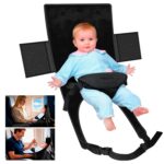TRELC portable baby airplane bed with storage bag, shown installed on an airplane tray table with an infant sleeping