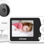 White VTimes VT31 baby monitor with camera and 2.4-inch parent unit, showing a clear view of a sleeping baby.