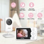 White VTimes VT31 baby monitor with camera and 2.4-inch parent unit, showing a clear view of a sleeping baby.