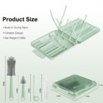YomauiYee 6-in-1 travel baby bottle brush set in brown, with brushes, drying rack, and soap dispenser in an open case.